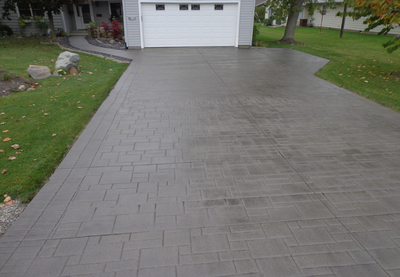 stamped grey concrete driveway done by Hartford Concrete.