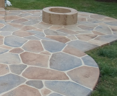 stamped concrete patio fire pit.